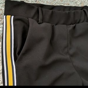 NEVER WORN black joggers with yellow/white stripe